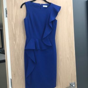 Sleek Calvin Klein ruffle front dress